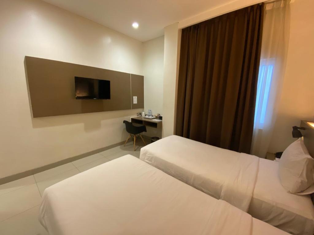 Opi Indah Hotel Palembang Eksteriør bilde