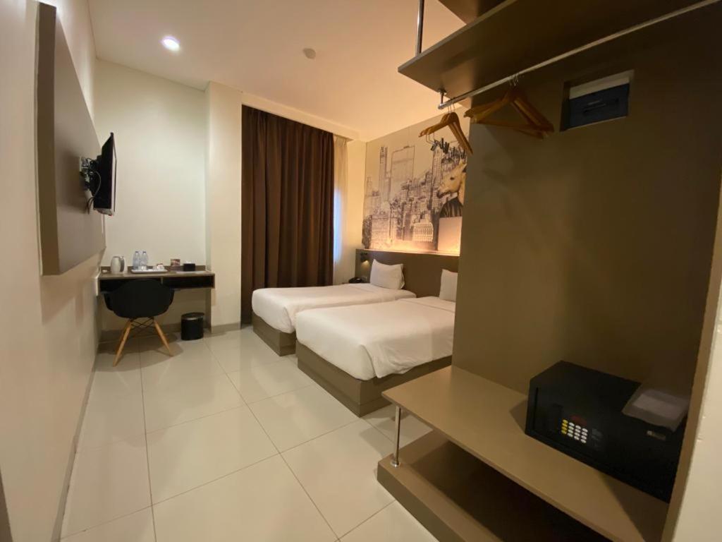 Opi Indah Hotel Palembang Eksteriør bilde
